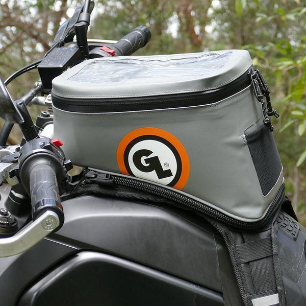 https://motocampnerd.com/cdn/shop/products/giant-loop-or-fandango-tank-bag-moto-camp-nerd-motorcycle-camping-1_grande.jpg?v=1698853410